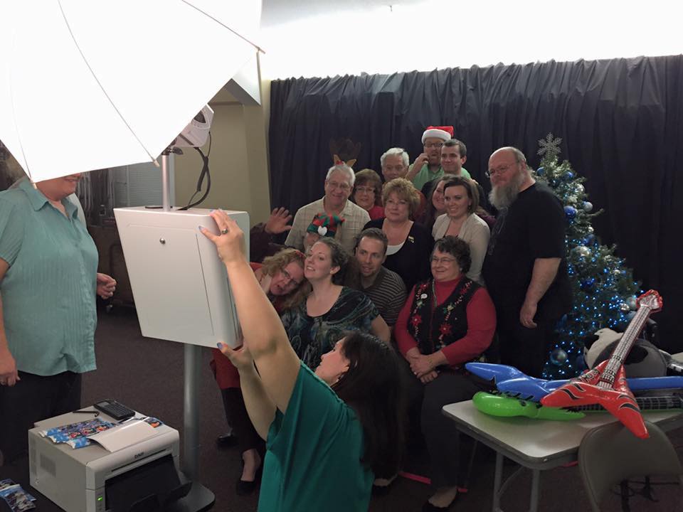 Large group at Christmas party in photo booth