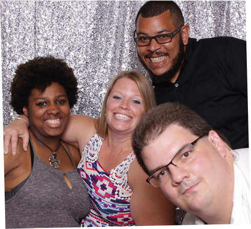 Friends in front of silver photo background