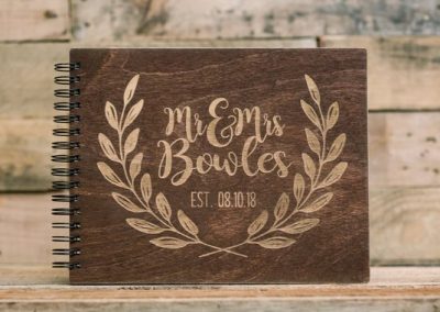 Bride and grooms names on photo album